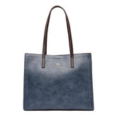 حقيبة كتف باللون الازرق الغامق وذراع بنى اللون متوسطة الحجم وبملمس ناعم - KSA